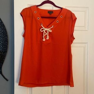 The limited orange top